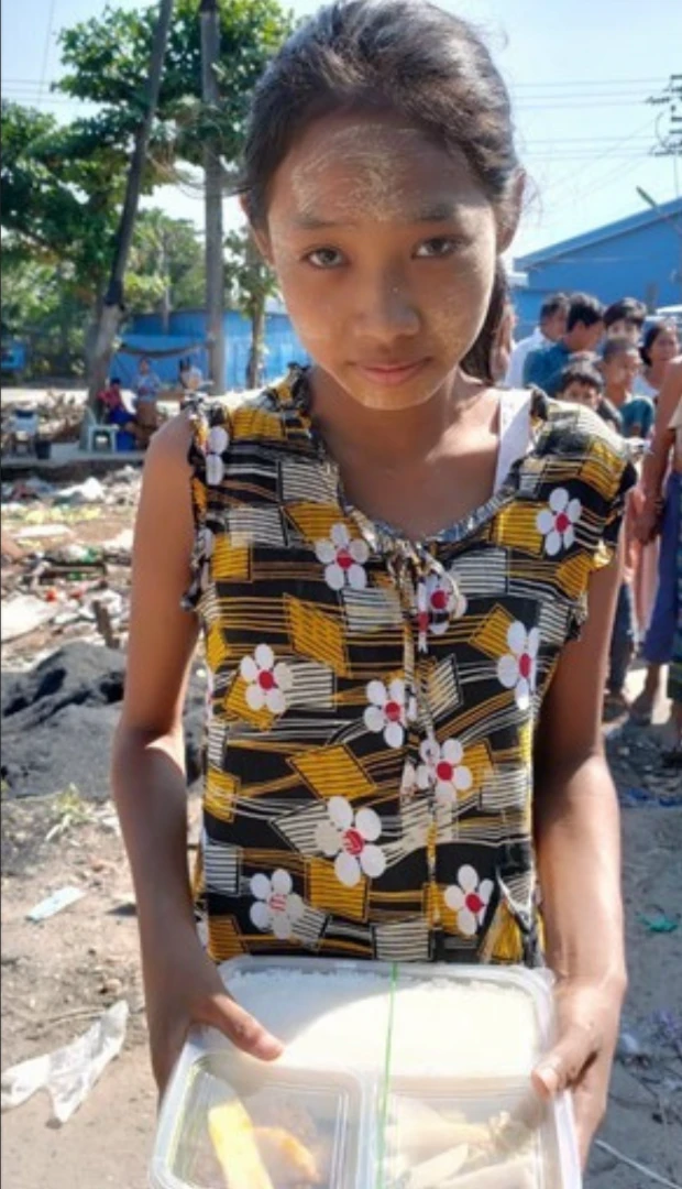 Young girl receiving ready made meal