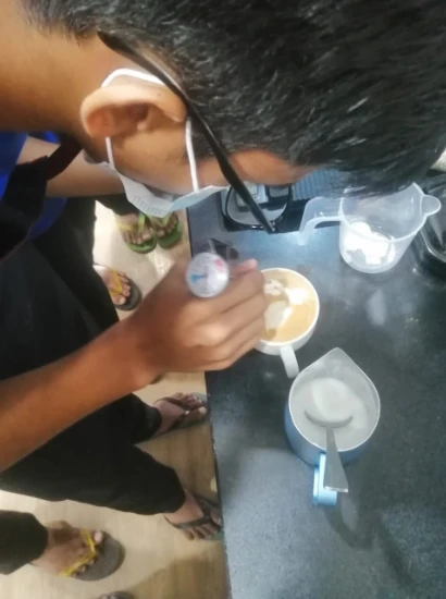 SISU trainees learning coffee art