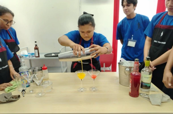 SISU trainees learning how to make cocktails
