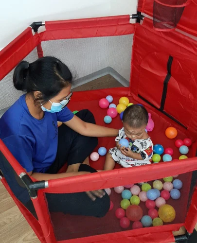 SISU trainees learning baby and child care play time