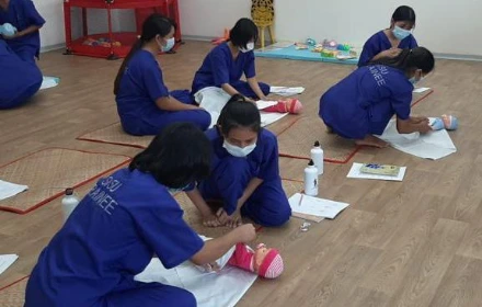 SISU trainees learning infant and child care